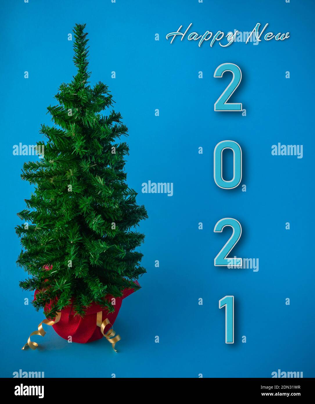 Christmas tree on blue background Stock Photo - Alamy
