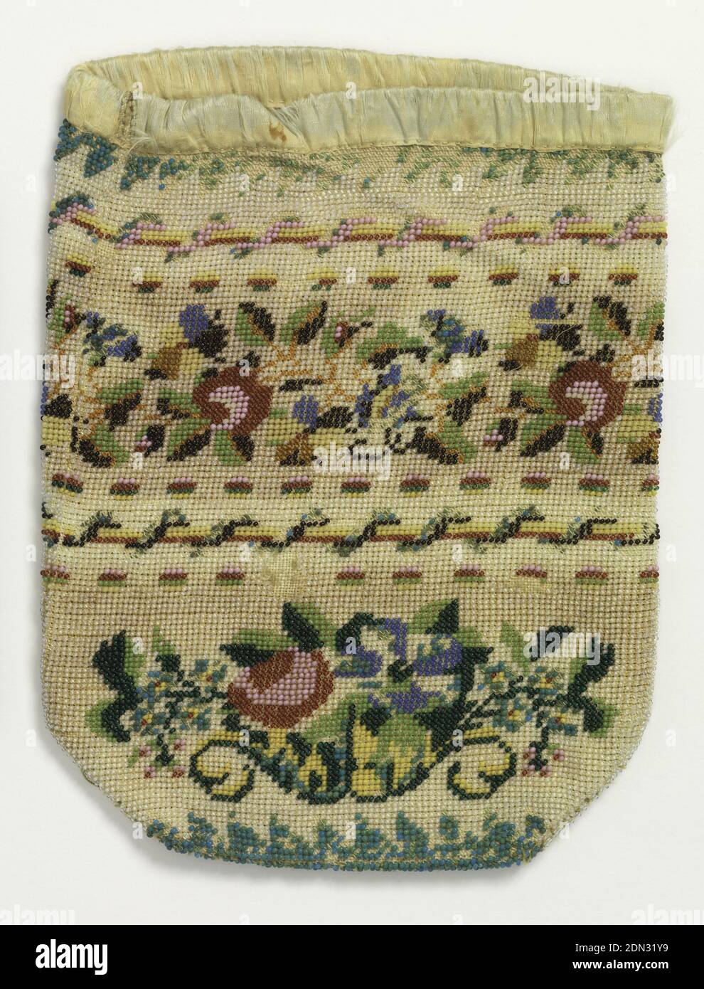 Bag, Medium: cotton, glass and ceramic beads Technique: embroidered beadwork, Colored glass beads strung and stitched to cotton foundation, with a design of cornucopias of flowers, with twined-rope borders. Bound with ribbon at the top., USA, early 19th century, costume & accessories, Bag Stock Photo