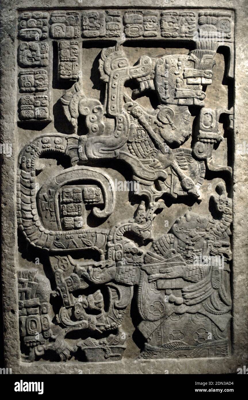 Lintel 25. Lady K'ab'al Xook. Lady Xook is in the hallucinatory stage of the bloodletting ritual. She conjures before her a vision of a Teotihuacan serpent. This lintel is one of a series of three panels from Structure 23 at Yaxchilan. Limestone, 725-760. Late Classic Maya. Yaxchilan, Chiapas state, Mexico. British Museum. London, England, United Kingdom. Stock Photo