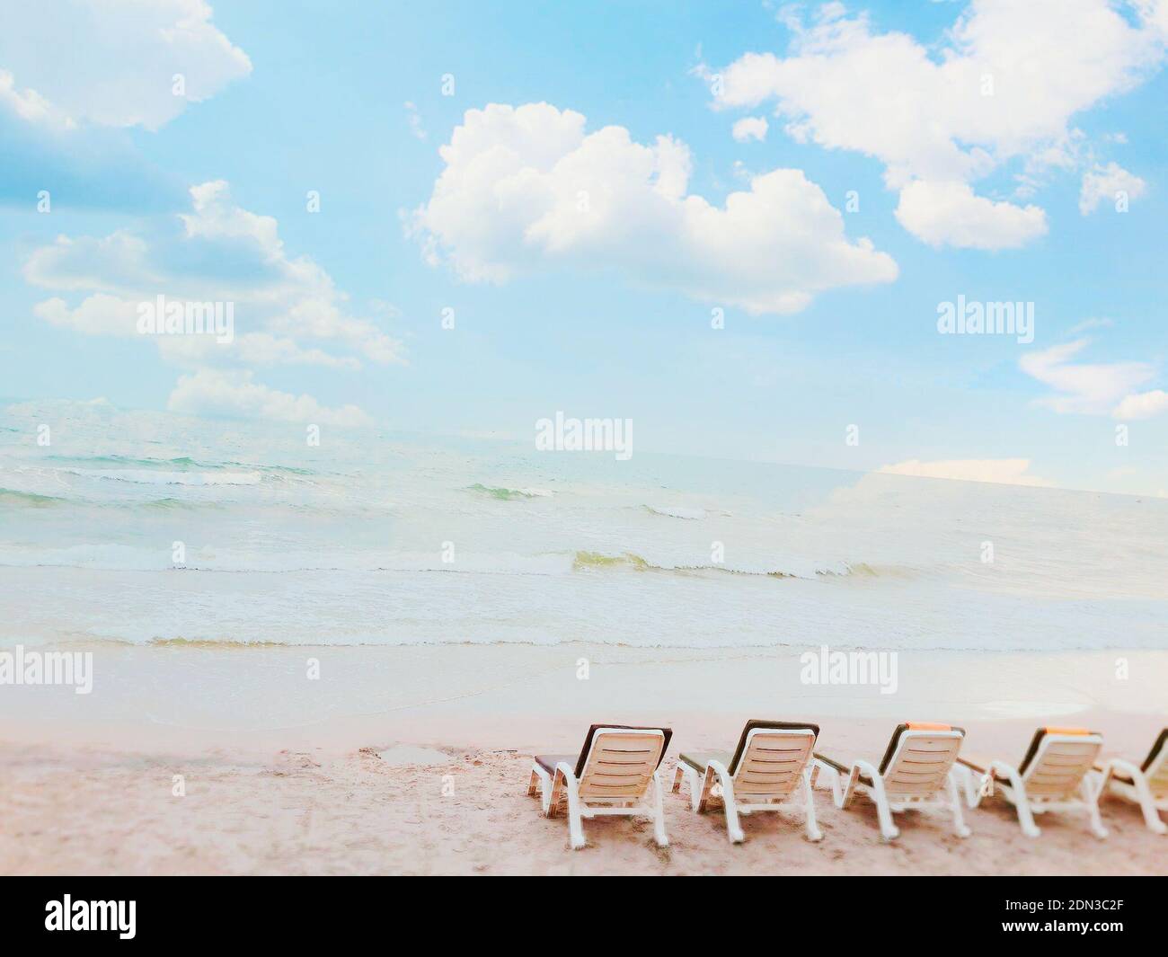 Chairs At Beach Against Sky Stock Photo Alamy