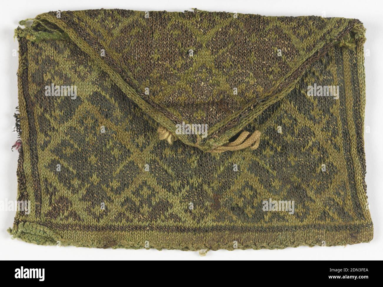 Card case, Medium: silk, gold-colored foil-wrapped around silk core thread Technique: stranded knitting, Small rectangular purse with triangular flap. Green background with repeating pattern of diamond-shaped blossoms in metallic yarns. Same pattern on both sides., Italy or Spain, early–mid-17th century, costume & accessories, Card case Stock Photo