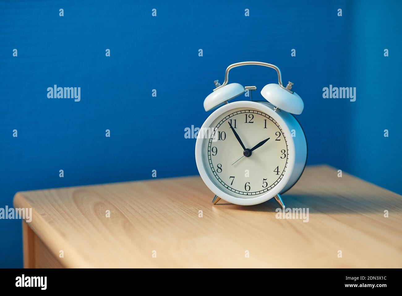 Alarm Clock on a Shelf Stock Photo