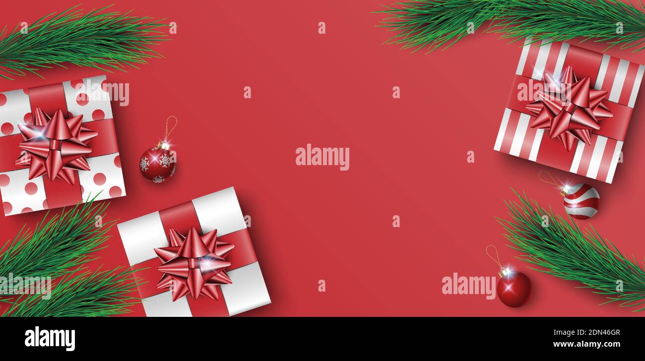 Christmas gifts box on red background with copy space for text