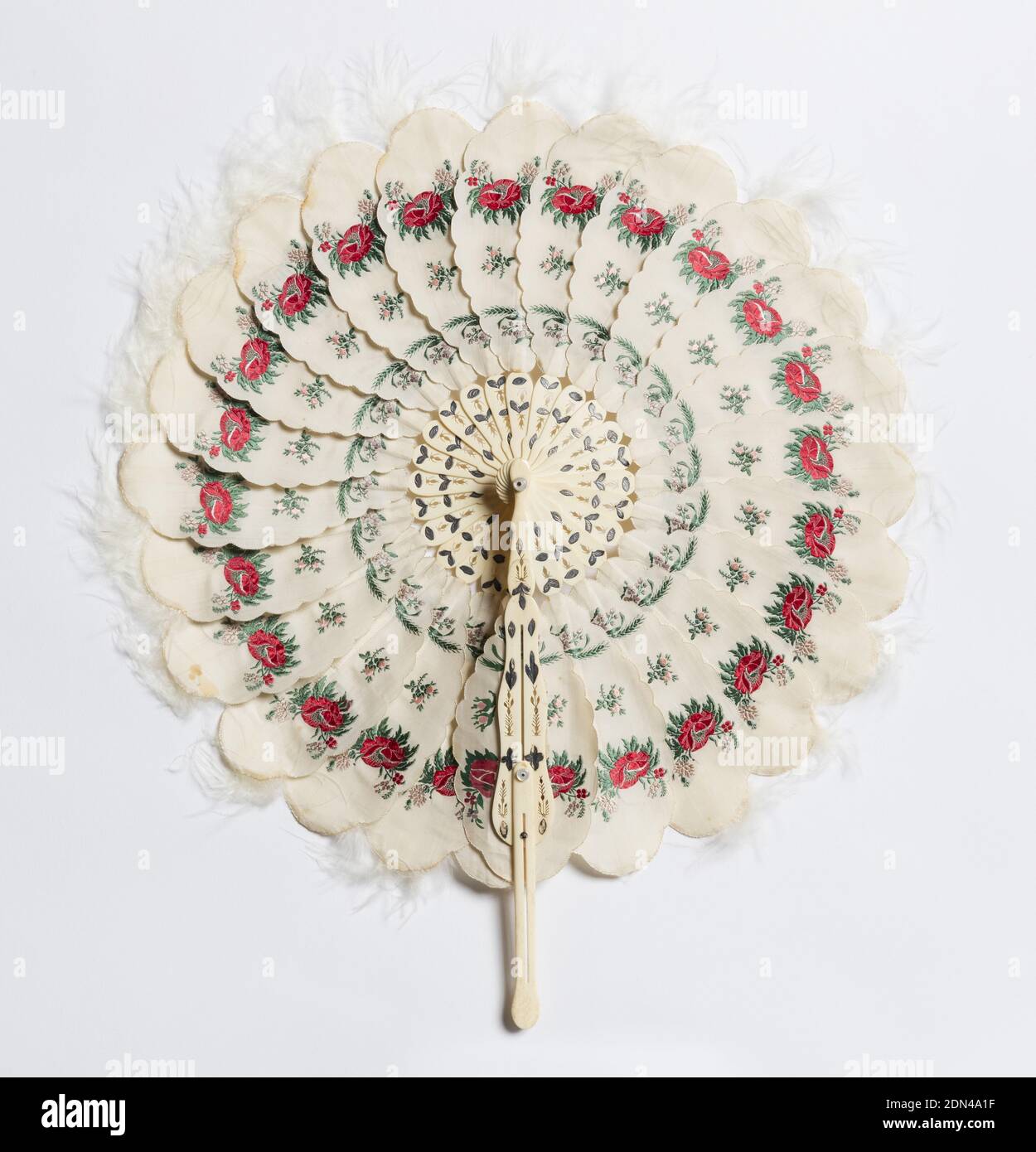 Cockade fan, Brocaded silk leaves trimmed with marabou, incised and drilled bone sticks with metallic foil, Cockade fan with white silk leaves with scalloped edges, each brocaded with a red flower, and trimmed with white marabou., France, 1850–55, costume & accessories, Cockade fan Stock Photo