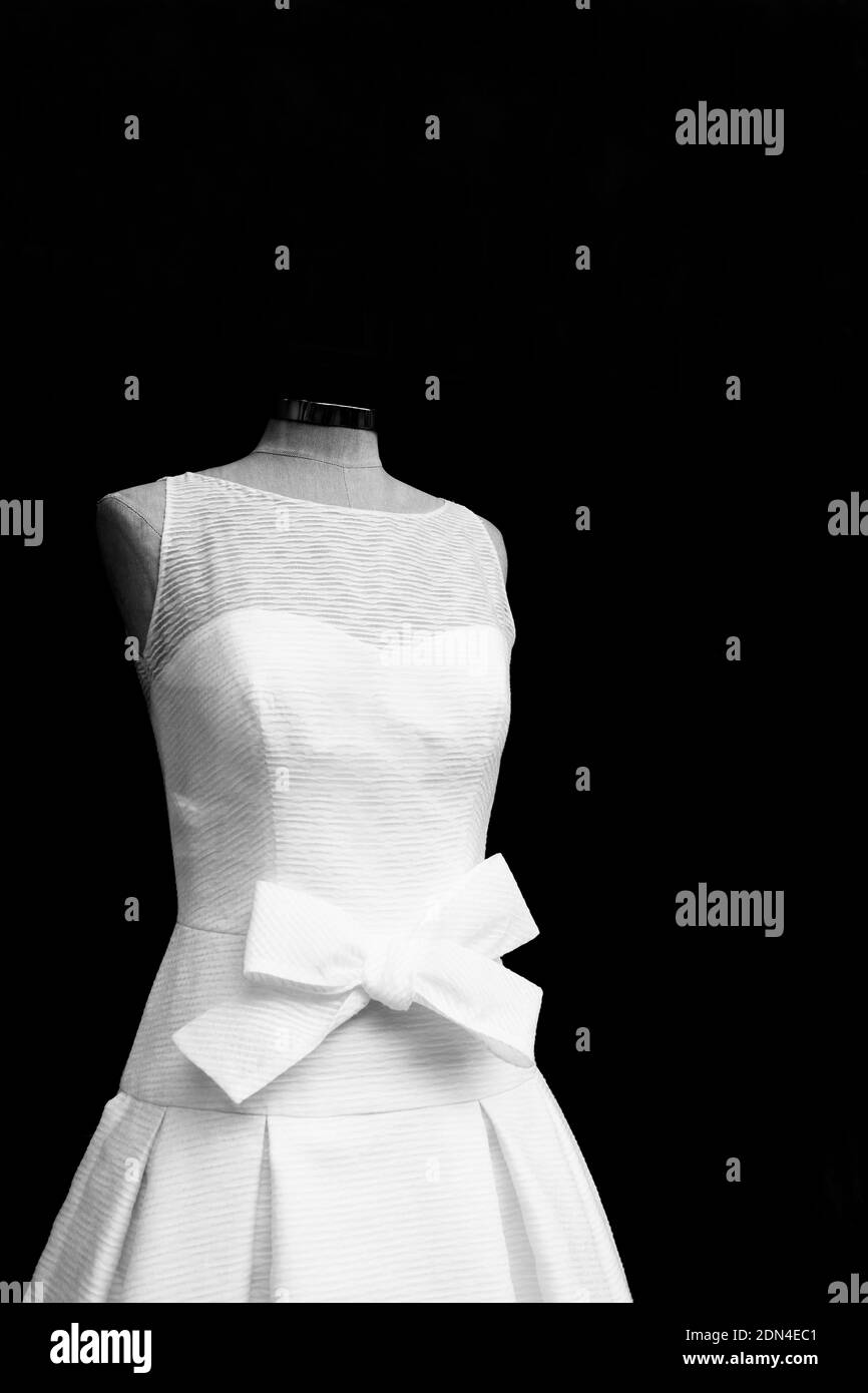 Dress In Mannequin Against Black Background Stock Photo Alamy