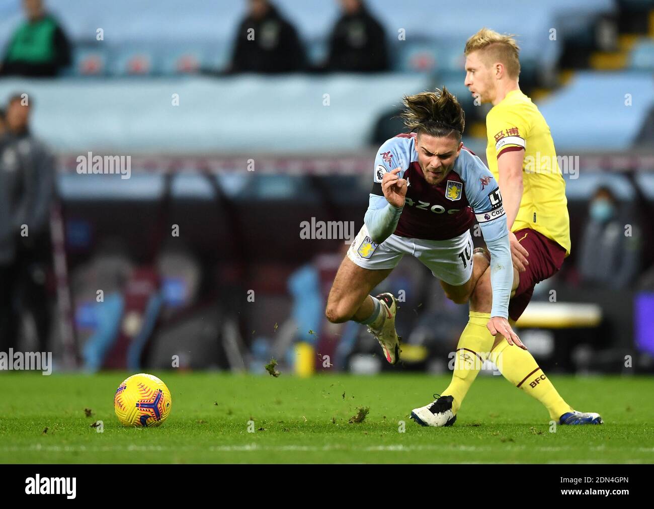 Burnley's Ben Mee (right) tackles Aston Villa's Jack Grealish during the Premier League match at Villa Park, Birmingham. Stock Photo