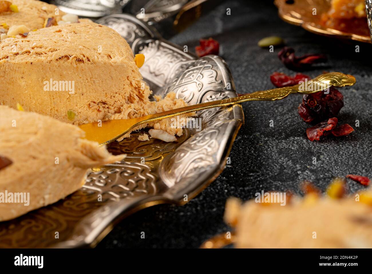 Close up photo of halva dessert on silver plate Stock Photo Alamy