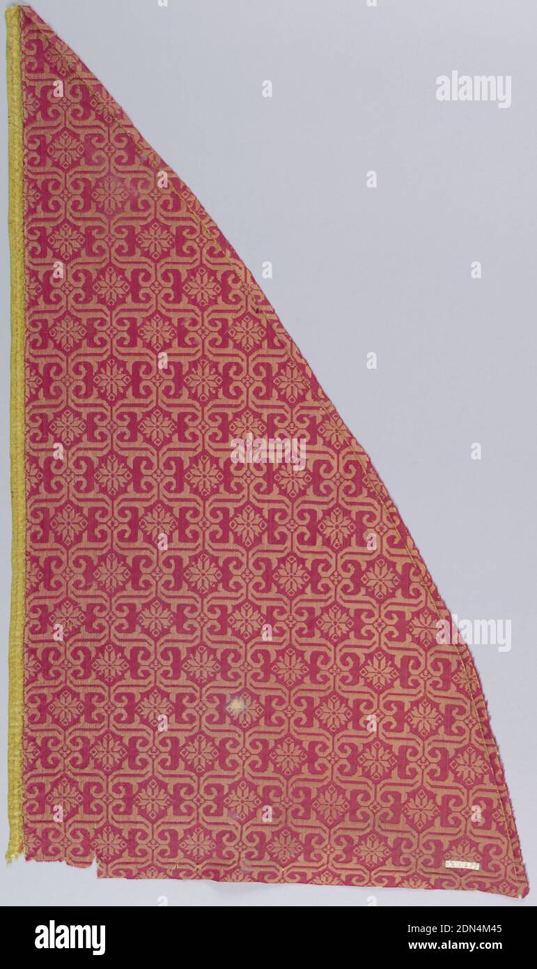 Fragment, Medium: silk Technique: 4&1 satin damask, 'S' curves in rectangular arrangement frame rosettes. In red and yellow., 17th century, woven textiles, Fragment Stock Photo