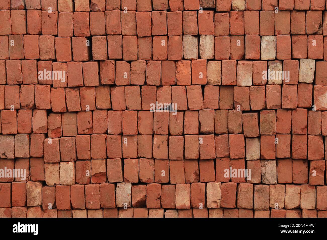 Brick Pattern. Stack of fresh processed bricks loosely stacked