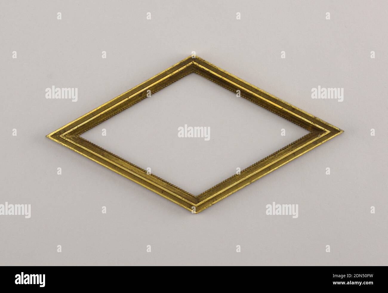 Frame, Cast and gilt bronze, Horizontally oriented lozenge-shaped form., France, ca. 1780, metalwork, Decorative Arts, Frame Stock Photo