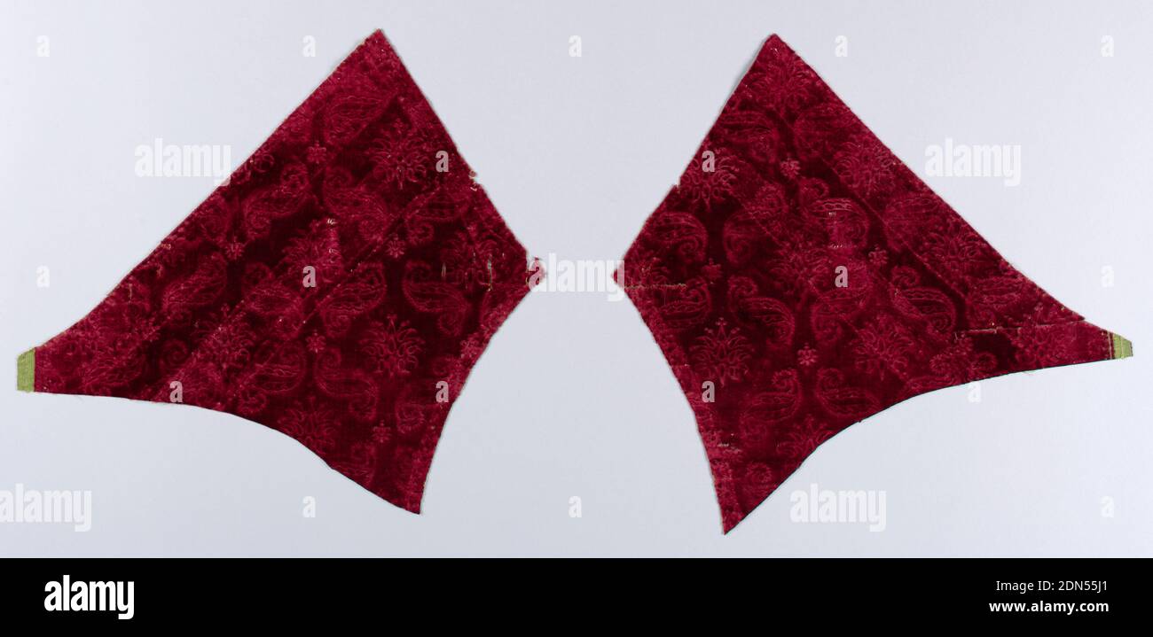 Fragments, Medium: silk Technique: cut loops of a supplementary warp in a plain weave-like foundation (velvet) with a stamped pattern, Two shaped fragments of a stamped deep red cut velvet. Rows of offset flowers enclosed in detached 'S' and 'Z' curves which form a diagonal square grid., Italy, 16th century, woven textiles, Fragments Stock Photo