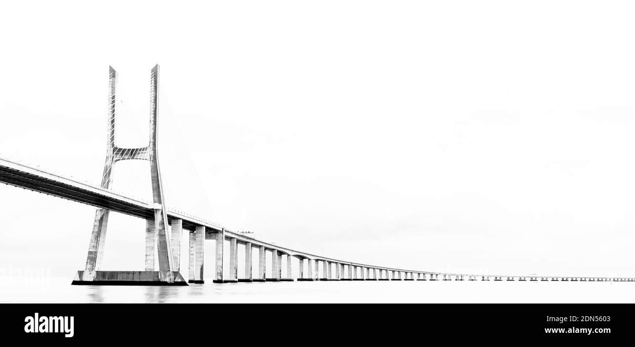 A high key panorama view of the Vasco da Gama Bridge in Lisbon Stock Photo