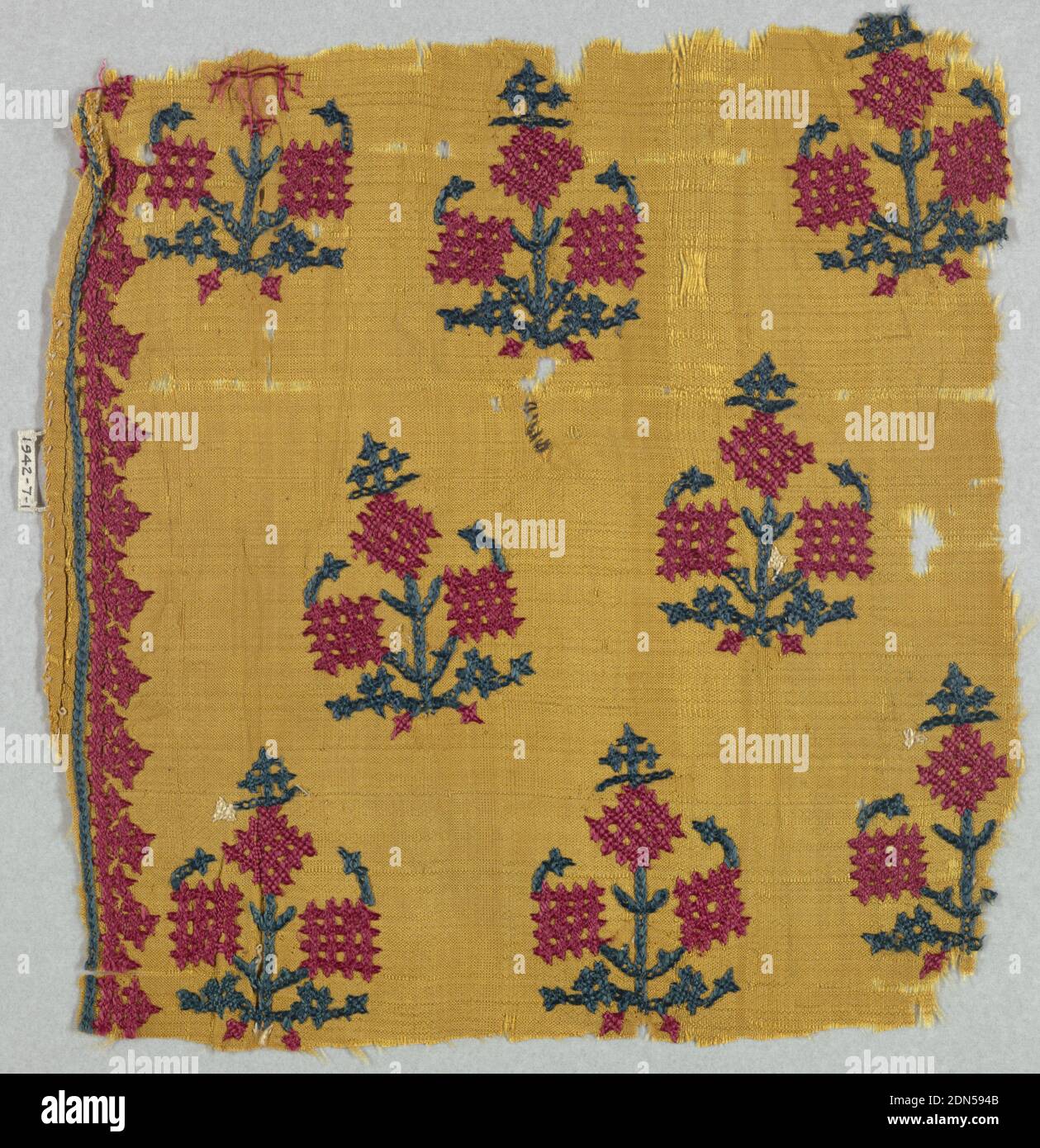 Fragment, Medium: silk Technique: surface stitch embroidery, Conventionalized flowering sprays arranged as detached motifs. Narrow border on one side., India, 18th century, embroidery & stitching, Fragment Stock Photo