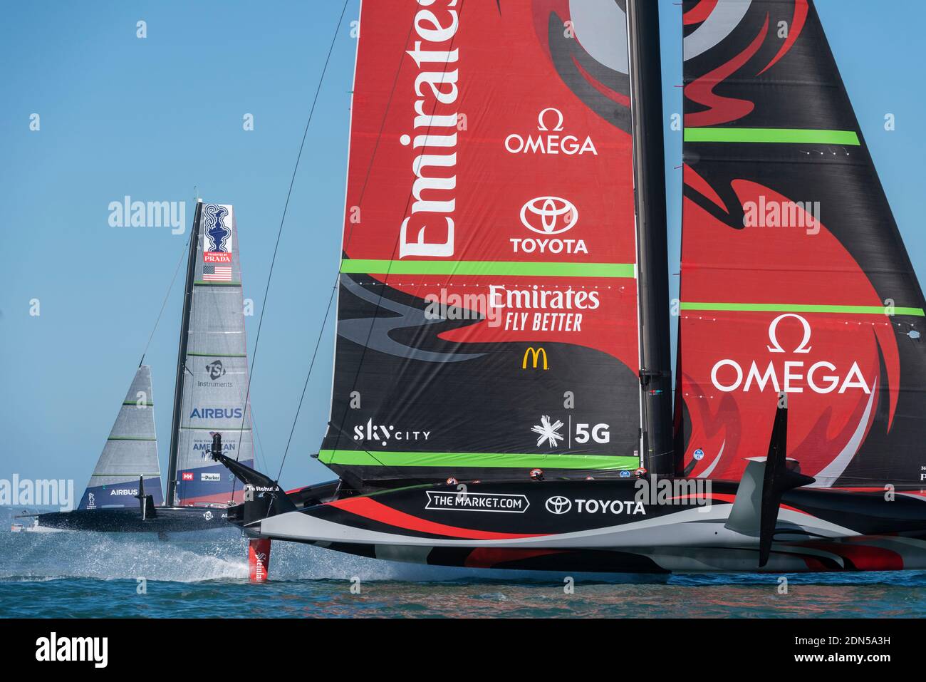 Emirates Team New Zealand chases American Magic in race four of the Regatta. PRADA America's Cup World Series Auckland Race Day One. 17/12/2020 Stock Photo