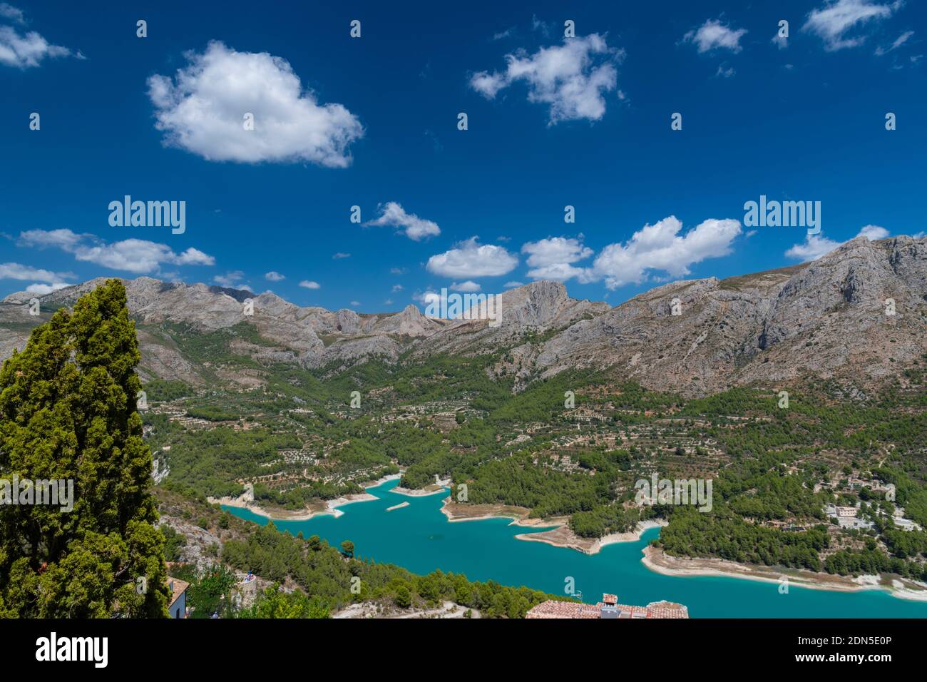 Scenic View Of Lake And Mountains Against Sky Stock Photo