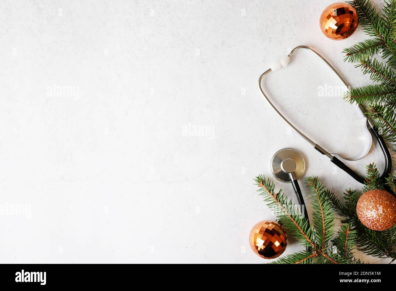 Christmas medicine background with stethoscope and golden new year