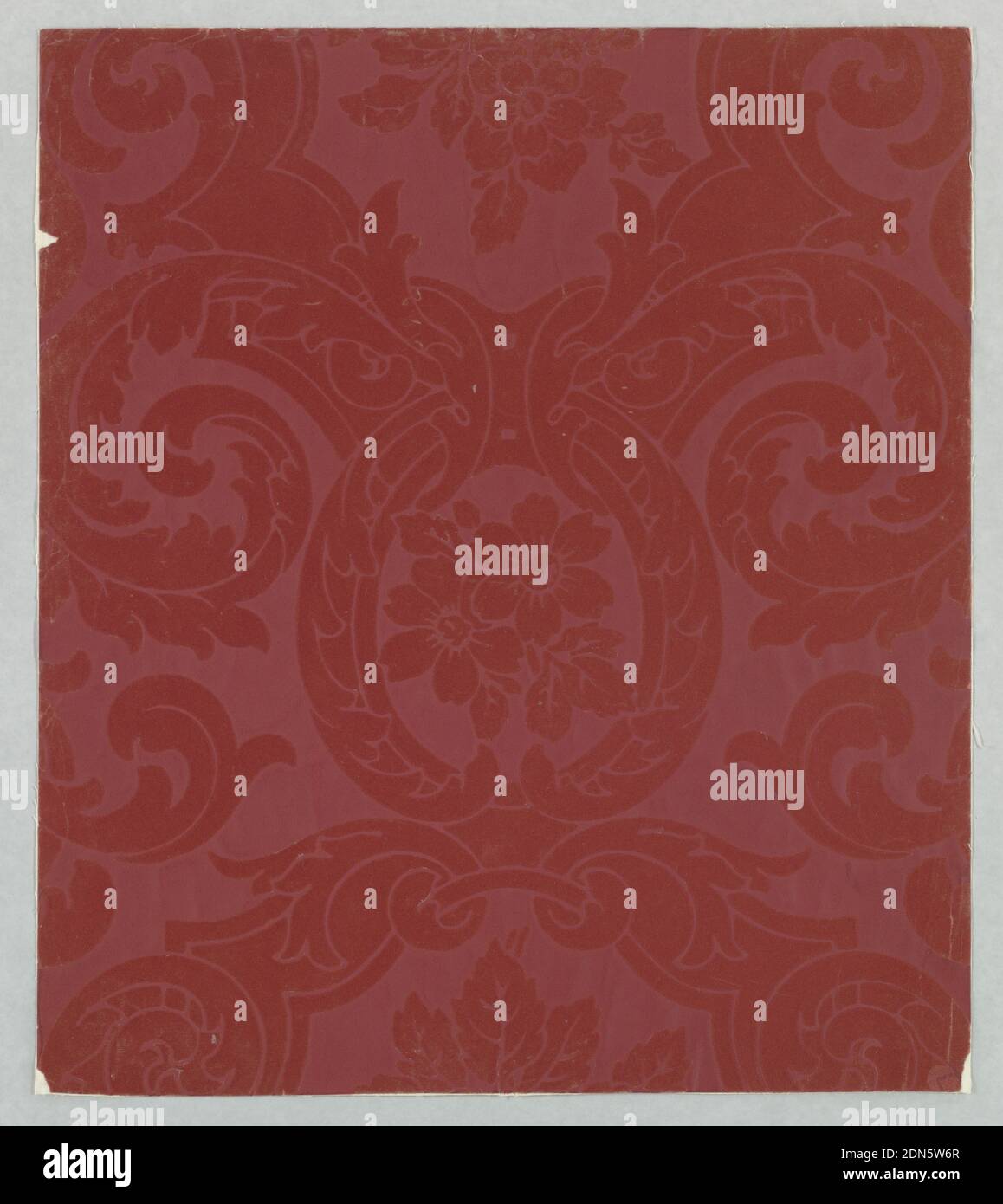 Sidewall, Block-printed, flocked, embossed, Simulates a damask design drawn in a large scale. Rococo and acanthus leaf scrolls forming medallions which contain clusters of single roses of five or six petals. Wool flock design is on a field of fine embossed horizontal lines; red two-toned wool flock on glazed embossed field., USA, 1920, Wallcoverings, Sidewall Stock Photo