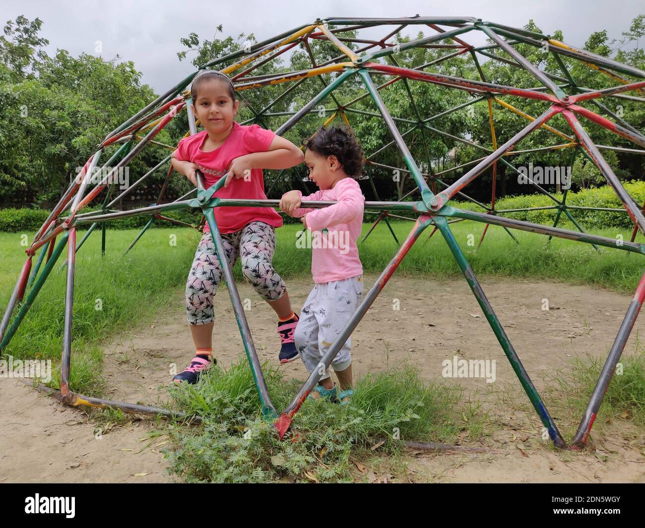 Children Playing On Jungle Gym In Playground Stock Photo Alamy