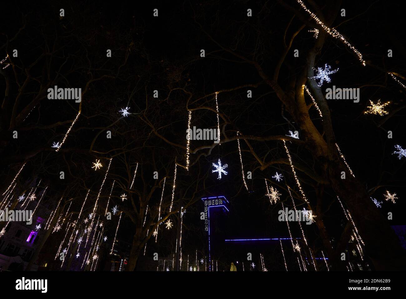London, UK. - 2 Dec 2020: Festive lights adorn Leicester Square for Christmas 2020. Stock Photo