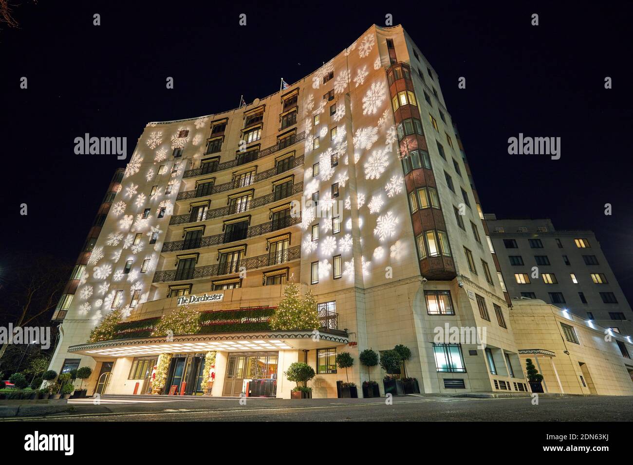 London, UK. - 17 Dec 2020: The Dorchester Hotel on Park Lane, projected with festive lights for the Christmas 2020 season. Stock Photo