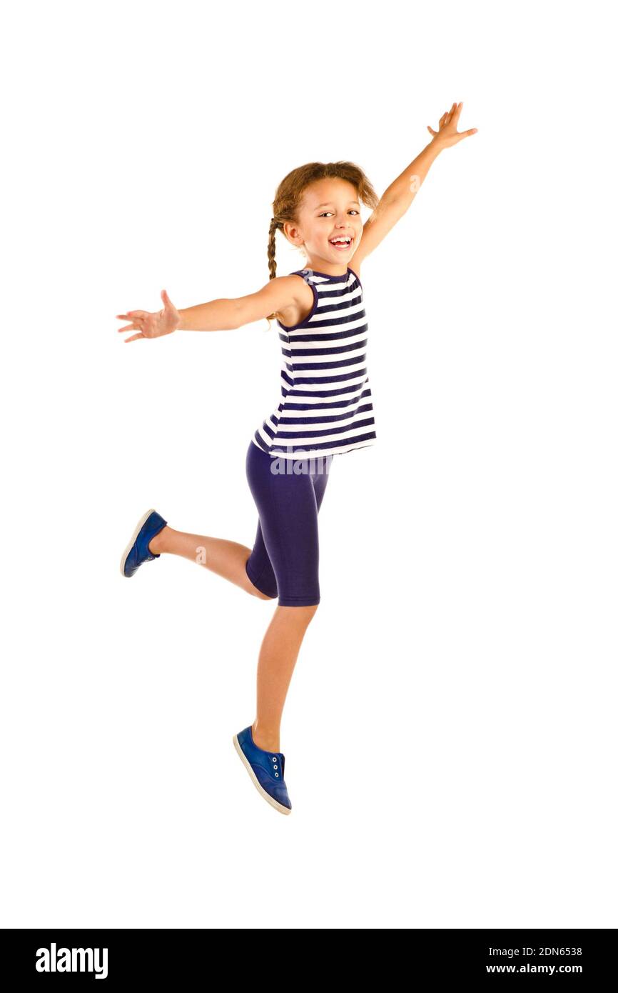 jumping little girl isolated on a white background Stock Photo