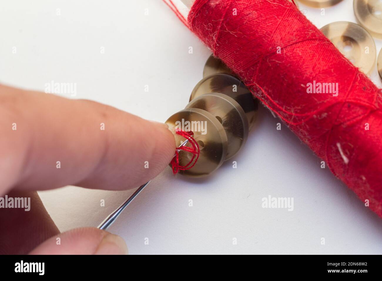 Person sewing southeast hires stock photography and images Alamy