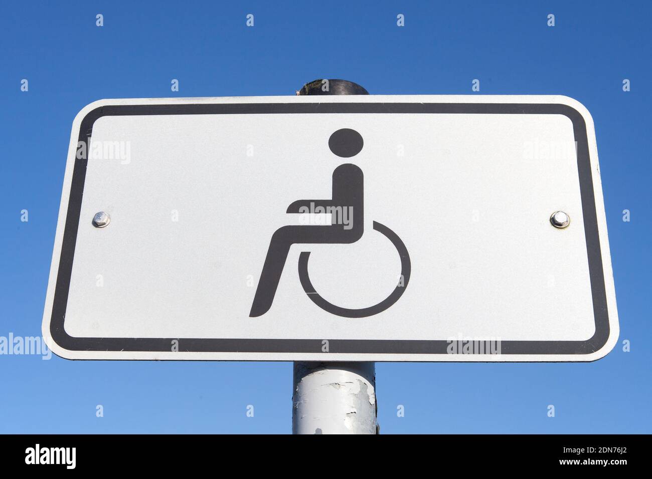 Traffic sign for a parking lot for disabled people Stock Photo