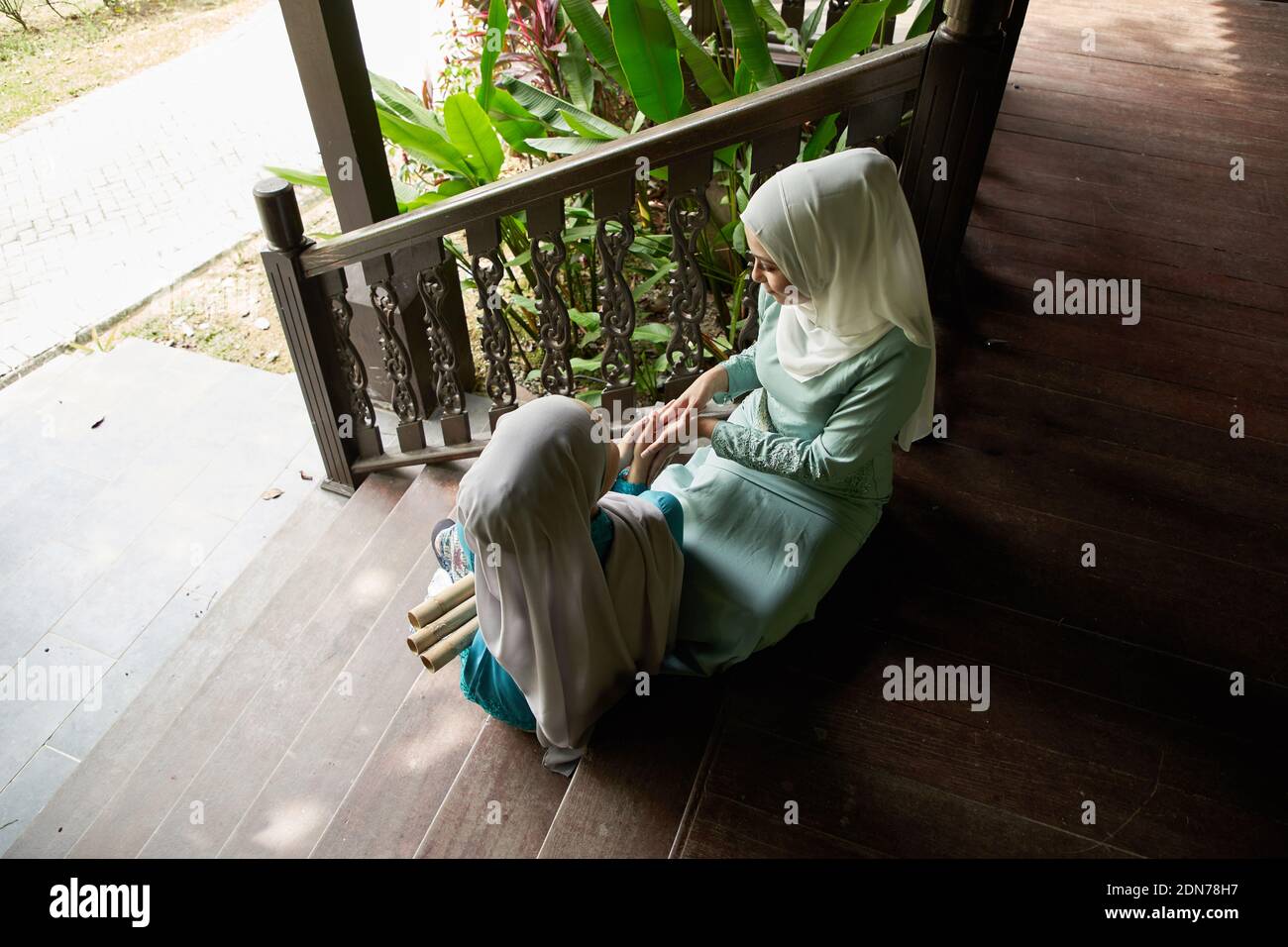 High Angle View Of Malay Hijab Sitting On Wooden Floor Stock Photo Alamy