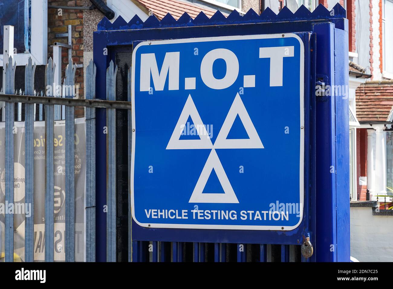 The blue three triangles logo at MOT test station in London England United Kingdom UK Stock Photo