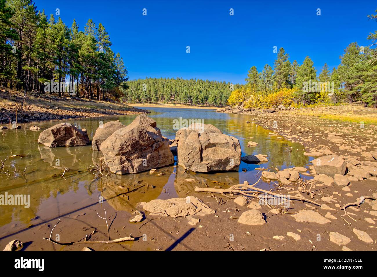 Large boulders in a lagoon on the southwest side of Dogtown Lake near Williams Arizona. This lagoon is part of Dogtown Wash that feeds into the lake. Stock Photo
