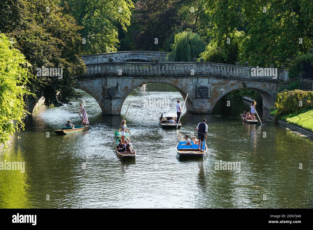 People punting on the River Cam in Cambridge, Cambridgeshire England United Kingdom UK Stock Photo