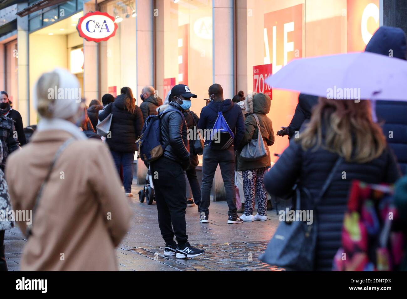 Hamburg, Germany. 15th Dec, 2020. People Line Up Outside A Department ...