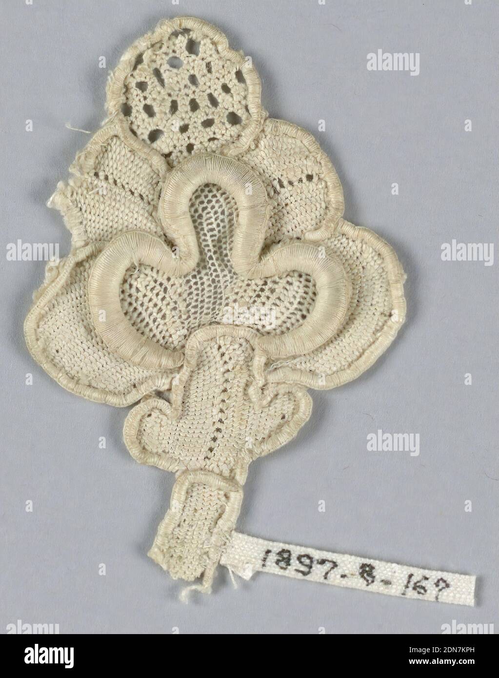 Fragment, Medium: linen Technique: needle lace, Fragment of raised lace with a highly conventionalized design of a pomegranate bud with an openwork tip., Venice, Italy, 17th century, lace, Fragment Stock Photo