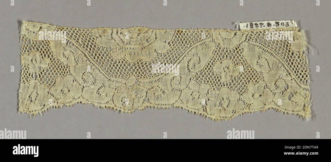 Fragment, Medium: linen Technique: bobbin lace (Valenciennes ground), Border fragment has a conventionalized design of blossoms and scrolls with round mesh., France, 18th century, lace, Fragment Stock Photo