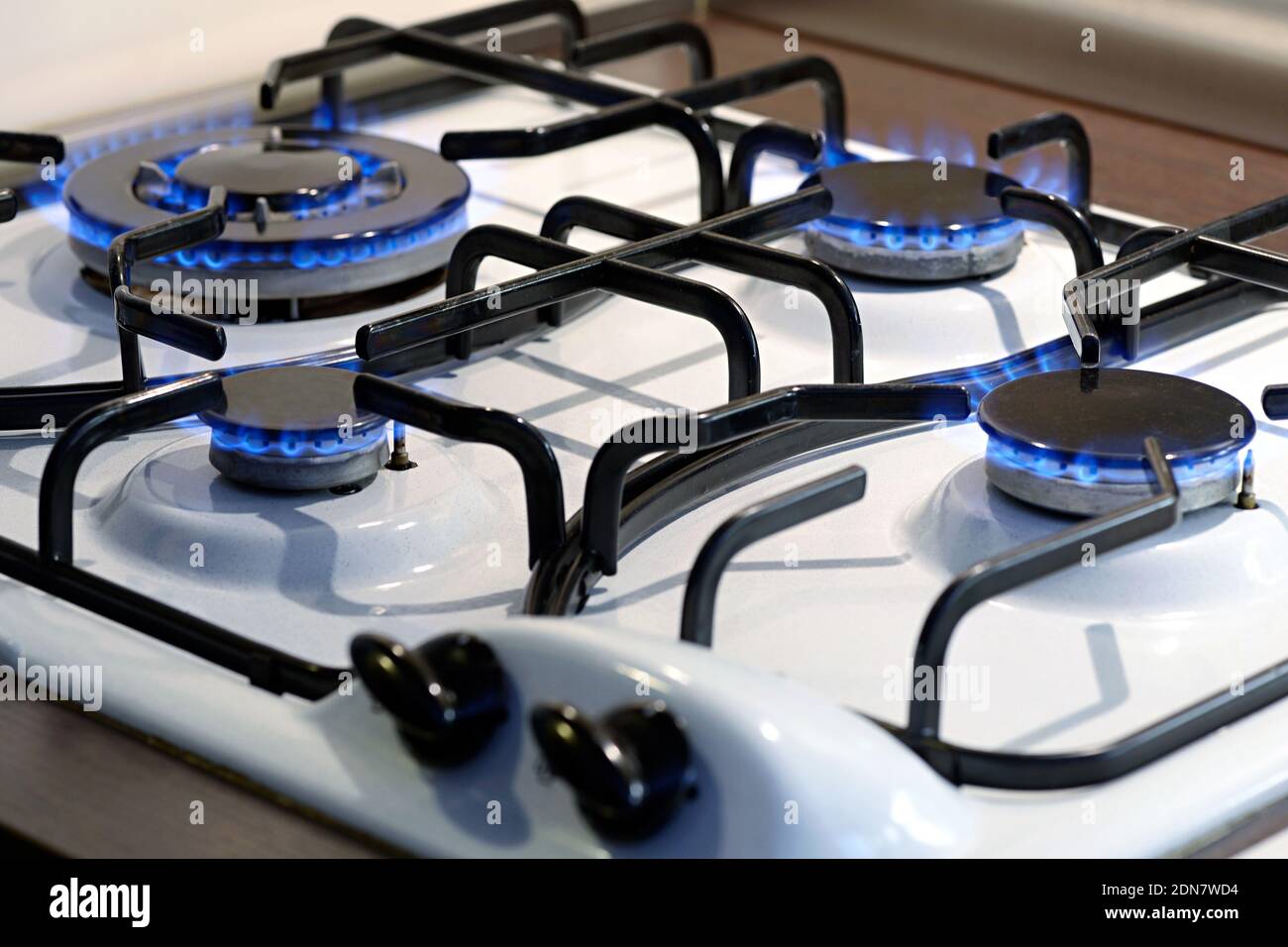 Lit blue gas stove burner hires stock photography and images Alamy