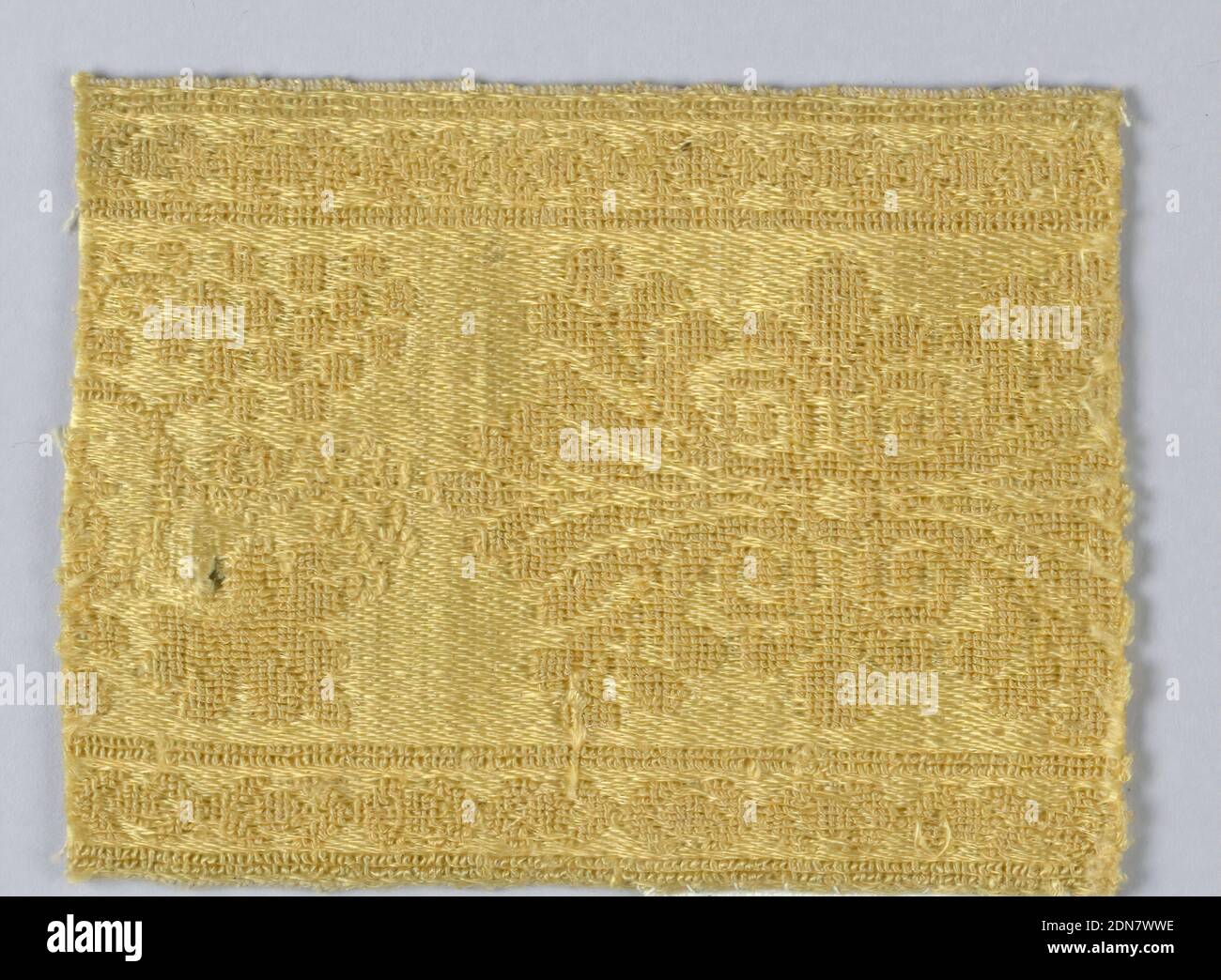 Trimming fragment, Medium: silk Tewchnique: woven, Vine and ornament within borders in yellow., France, 19th century, trimmings, Trimming fragment Stock Photo