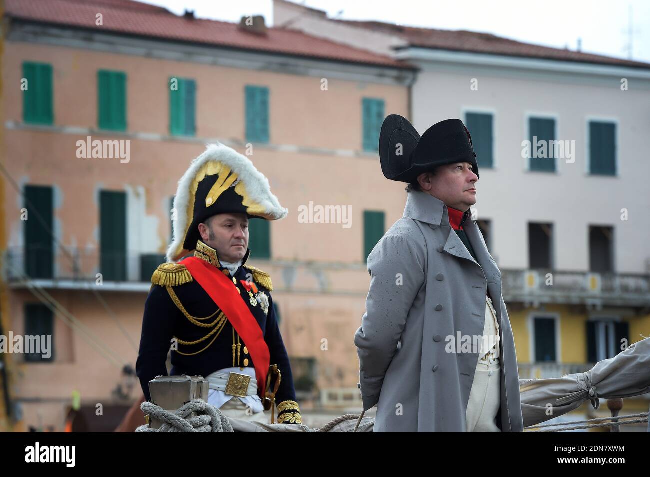 Italian enthusiast Roberto Colla, representing French Emperor Napoleon , stands on the ship 'Pandora' on February 22, 2015, in the harbour of Portoferraio on the island of Elba, Italy. The Italian island, where Napoleon was sent into exile in 1814, marks the 200th anniversary of the emperor leaving from Portoferraio and landing at the Golfe-Juan near Antibes,south of France, with enthusiast re-enacting the whole adventure. On February 28, 1814, British General Sir Neil Campbell realised with horror that his illustrious prisoner, Napoleon Bonaparte, had slipped away from the island of Elba. The Stock Photo