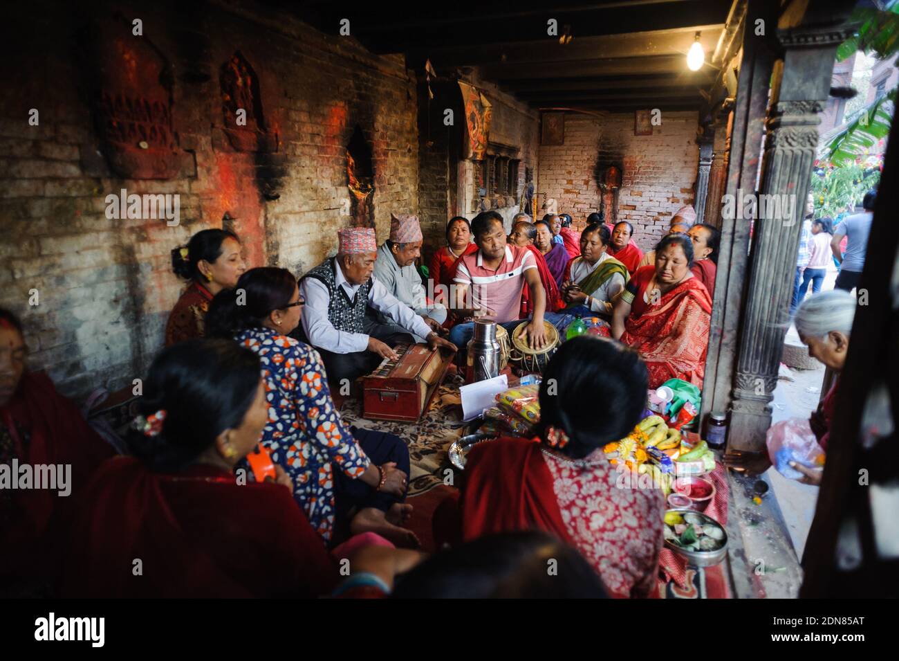 gathering of people in Bhactapur durbar plaza, they make offering Stock Photo