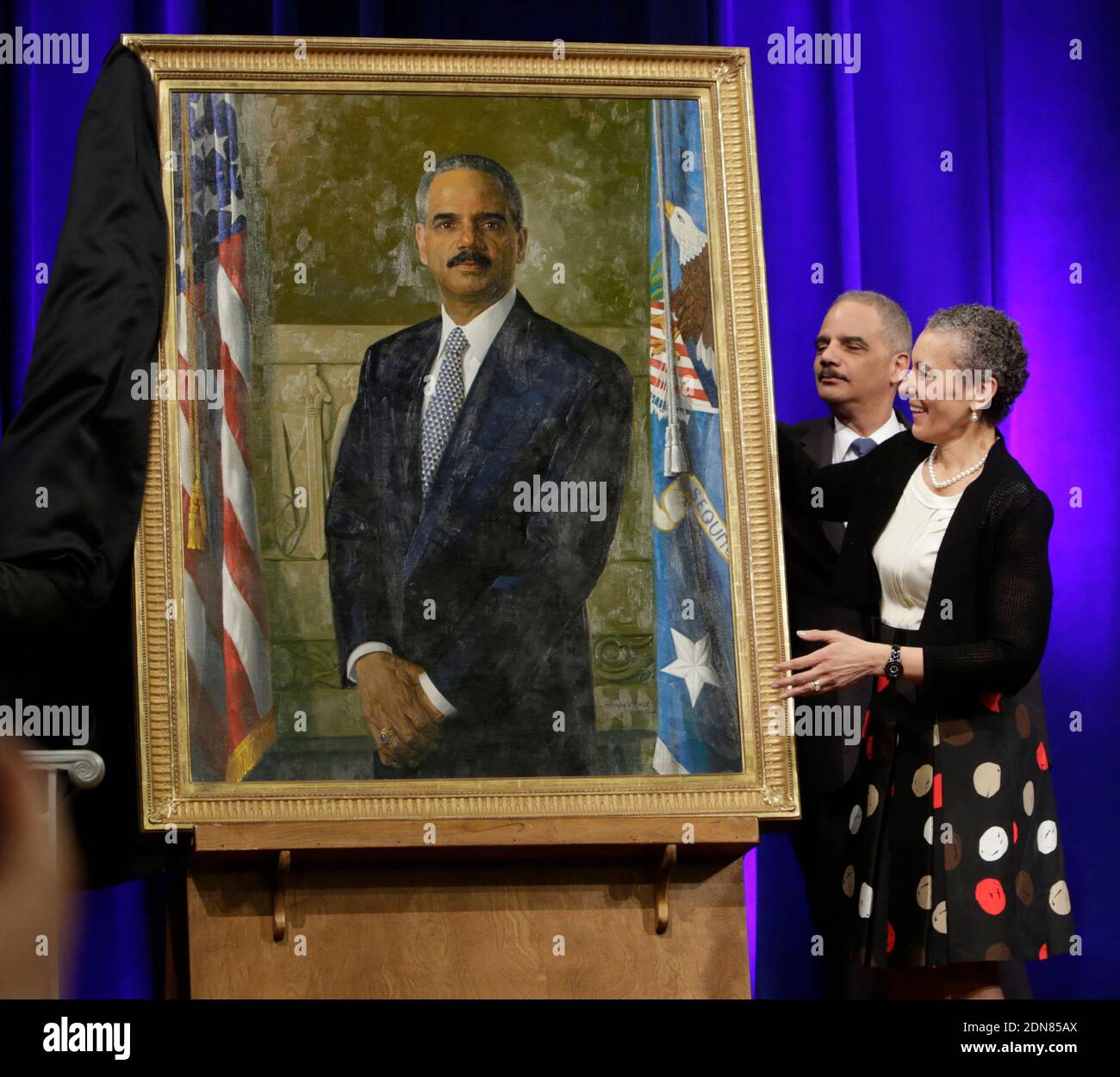 Outgoing U.S. Attorney General Eric Holder and his wife Sharon Malone
