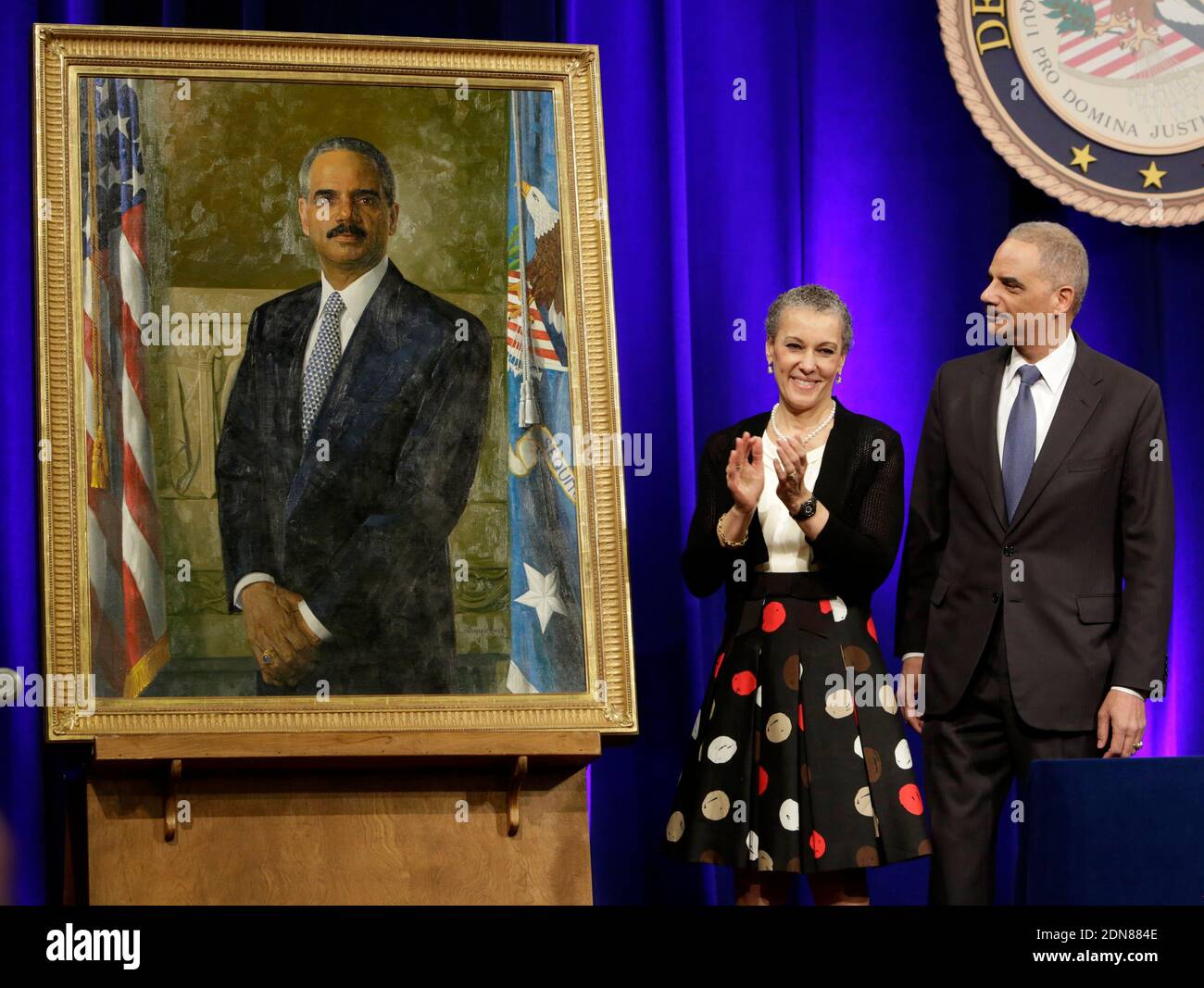 Outgoing U.S. Attorney General Eric Holder and his wife Sharon Malone