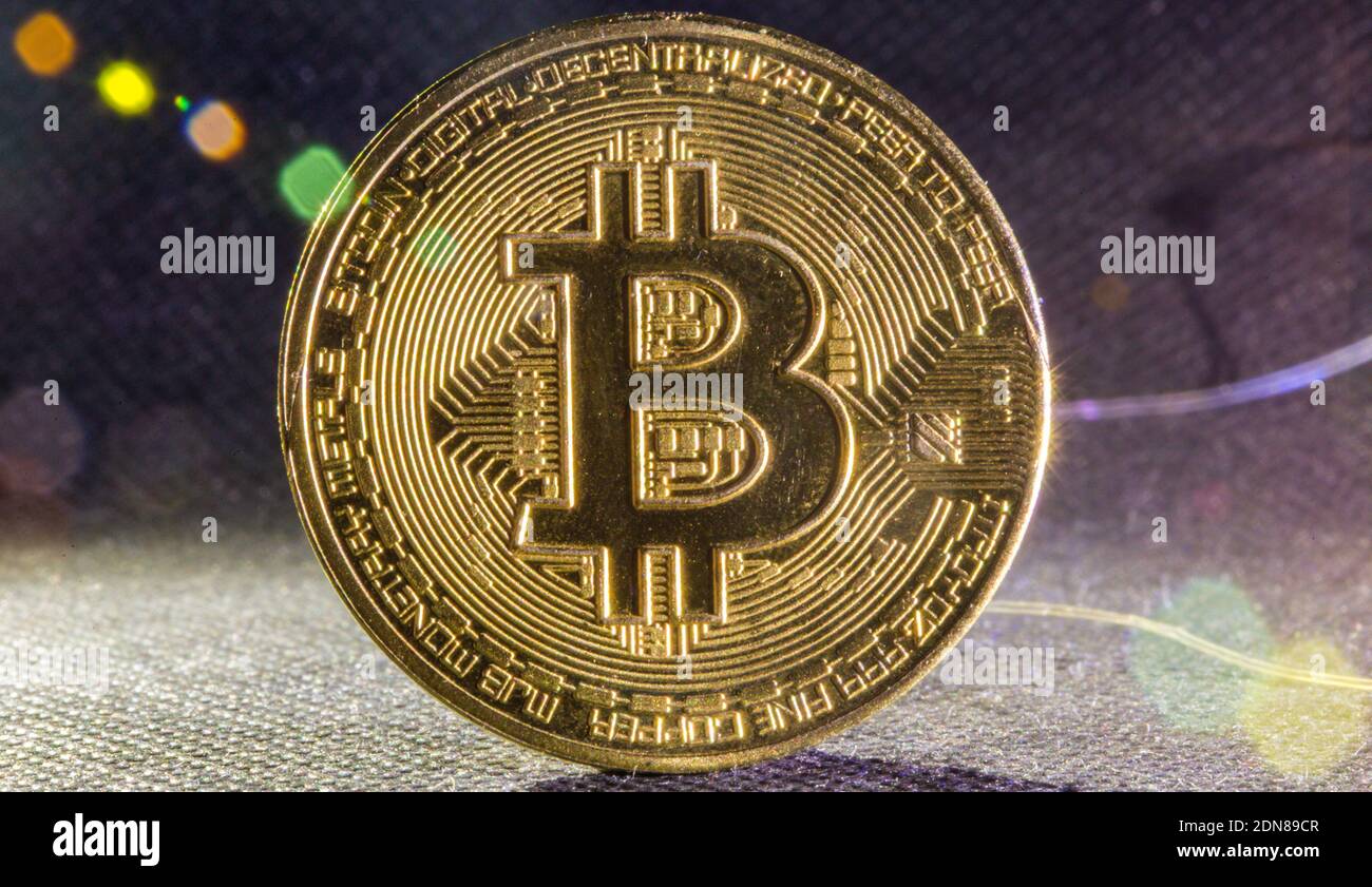 Golden bitcoin cryptocurrency with high value against fiat currency and  profitable mining. Digital gold and money of tomorrow Stock Photo - Alamy