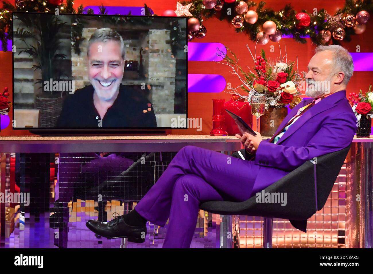 George Clooney appears via videolink during the filming for the Graham Norton Show at BBC Studioworks 6 Television Centre, Wood Lane, London, to be aired on BBC One on Friday evening. Stock Photo