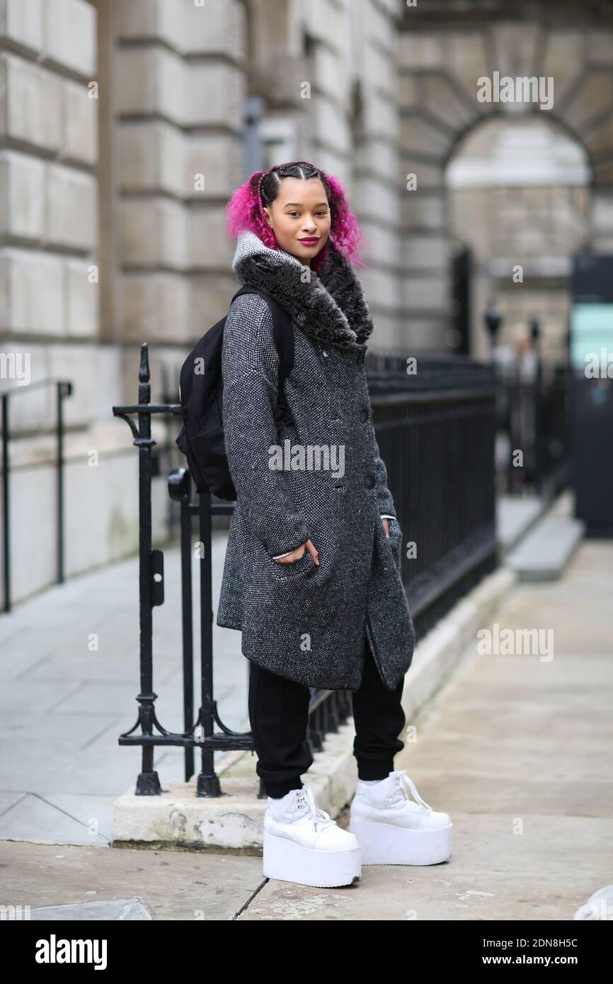Street style, Jordan Pritchett arriving at London fashion week  Ready-to-Wear Autumn-Winter 2015-2016 held at Somerset House, London,  England on February 20th, 2015. She is wearing Zara coat, Yru shoes, Vans  bag. Photo