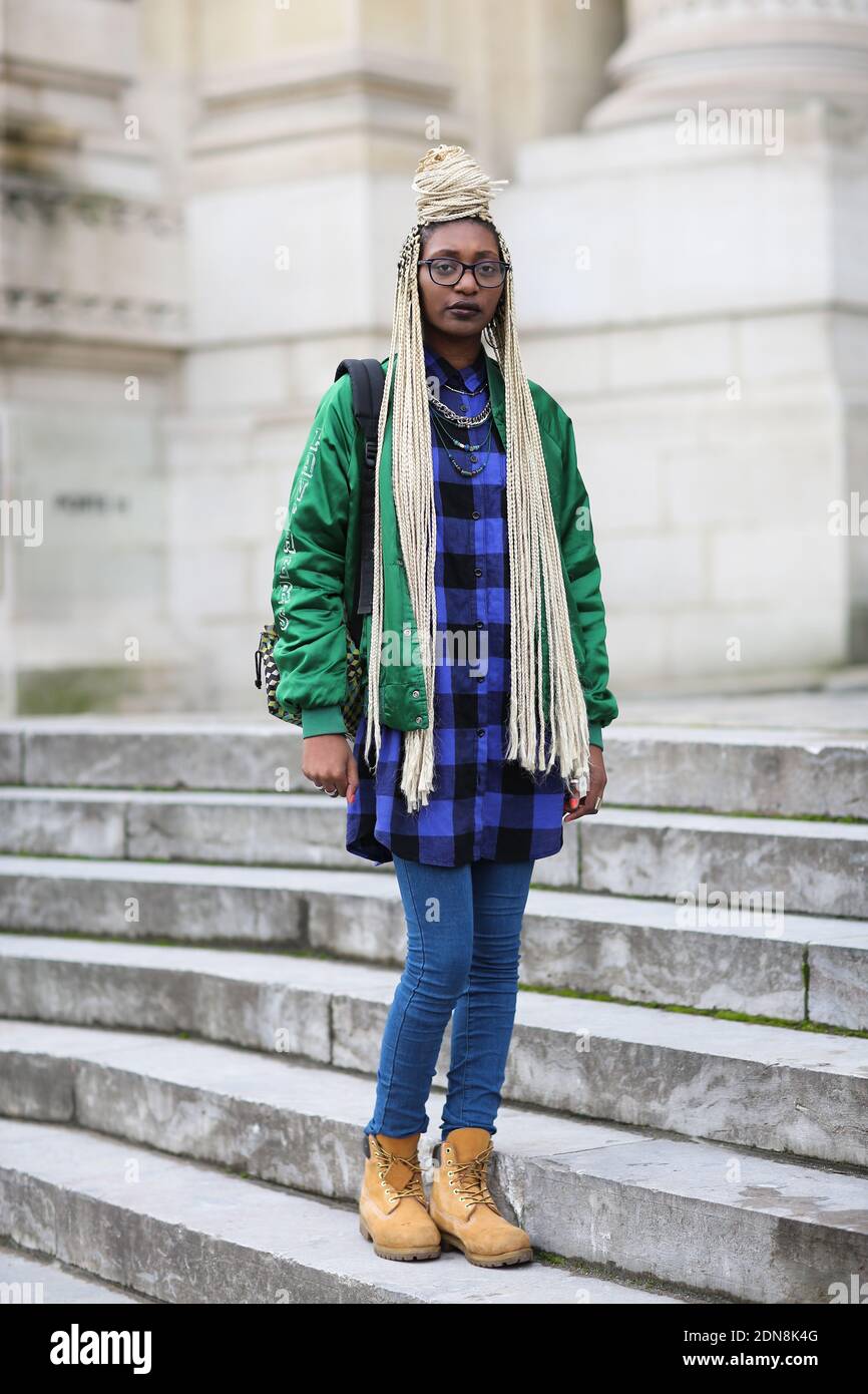 Street style, Leslie arriving at Chanel Spring-Summer 2015 Haute Couture  collection show held at Le Grand Palais in Paris, France, on January 27th,  2015. She is wearing vintage starter jacket, H&M shirt,