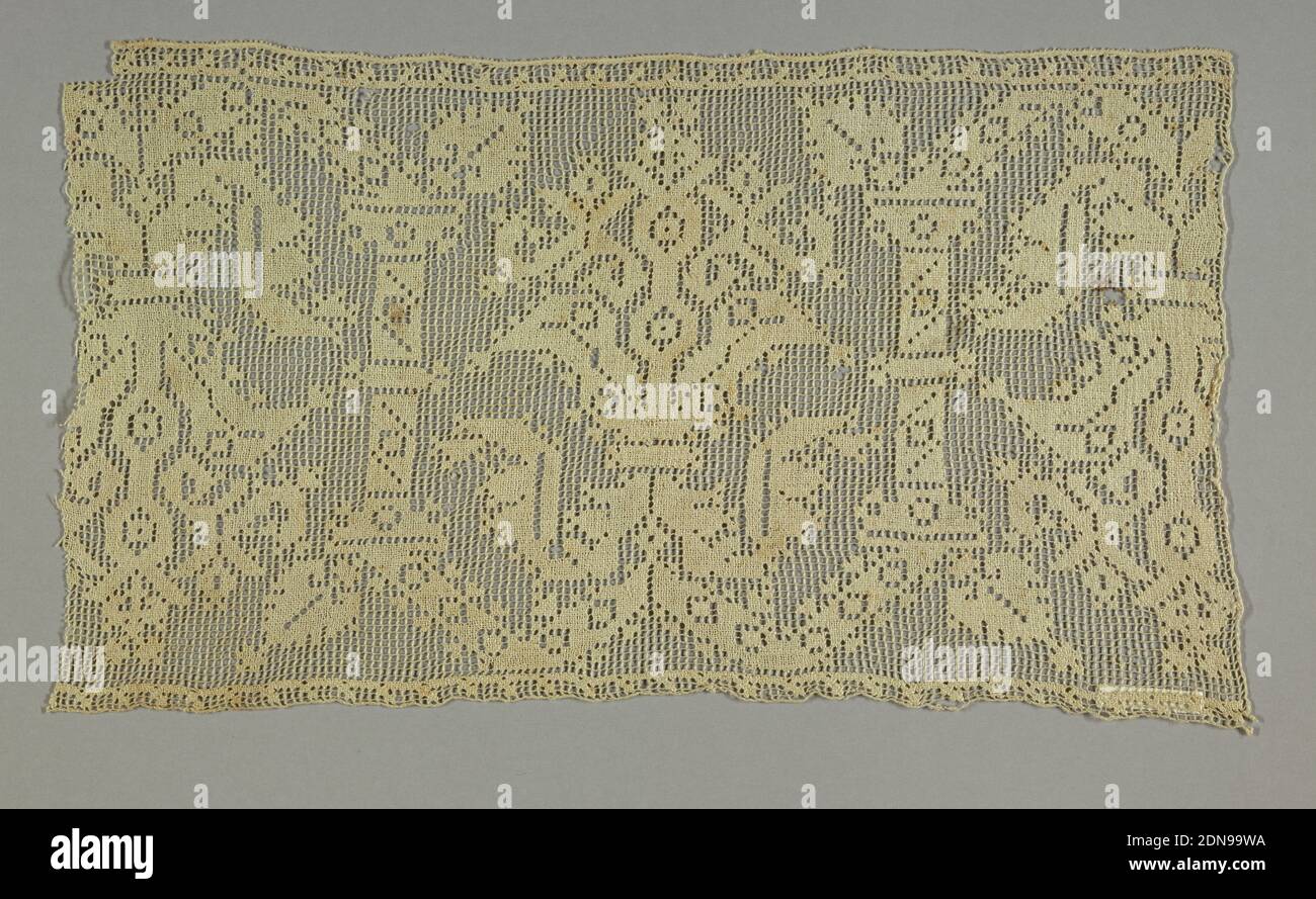 Fragment, Medium: linen Technique: needlework on hand knotted net, Fragment of a border with a symmetrical vine and flower pattern., Italy or Spain, 16th–17th century, lace, Fragment Stock Photo