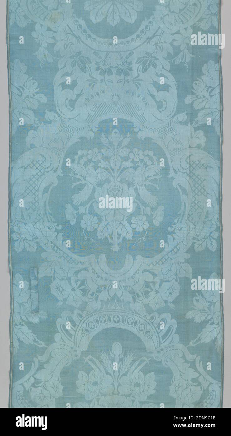 Textile, Medium: Technique: 4 & 1 satin damask; warp float face of the satin as background, Length of blue damask has dense scrolls and flowers that create medallion shapes, enclosing alternate flower bouquets., England, mid- 19th century, woven textiles, Textile Stock Photo