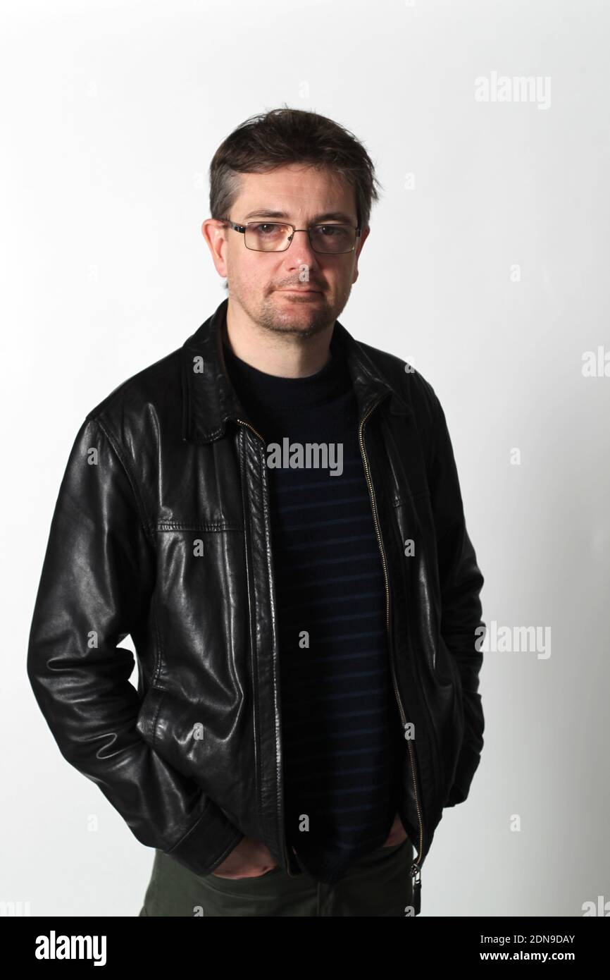Charlie Hebdo Cartoonist and Managing director Stephane Charbonnier aka Charb poses in Nantes, France, on January 2012. Photo by Yves-Marie Quemener/ABACAPRESS.COM Stock Photo