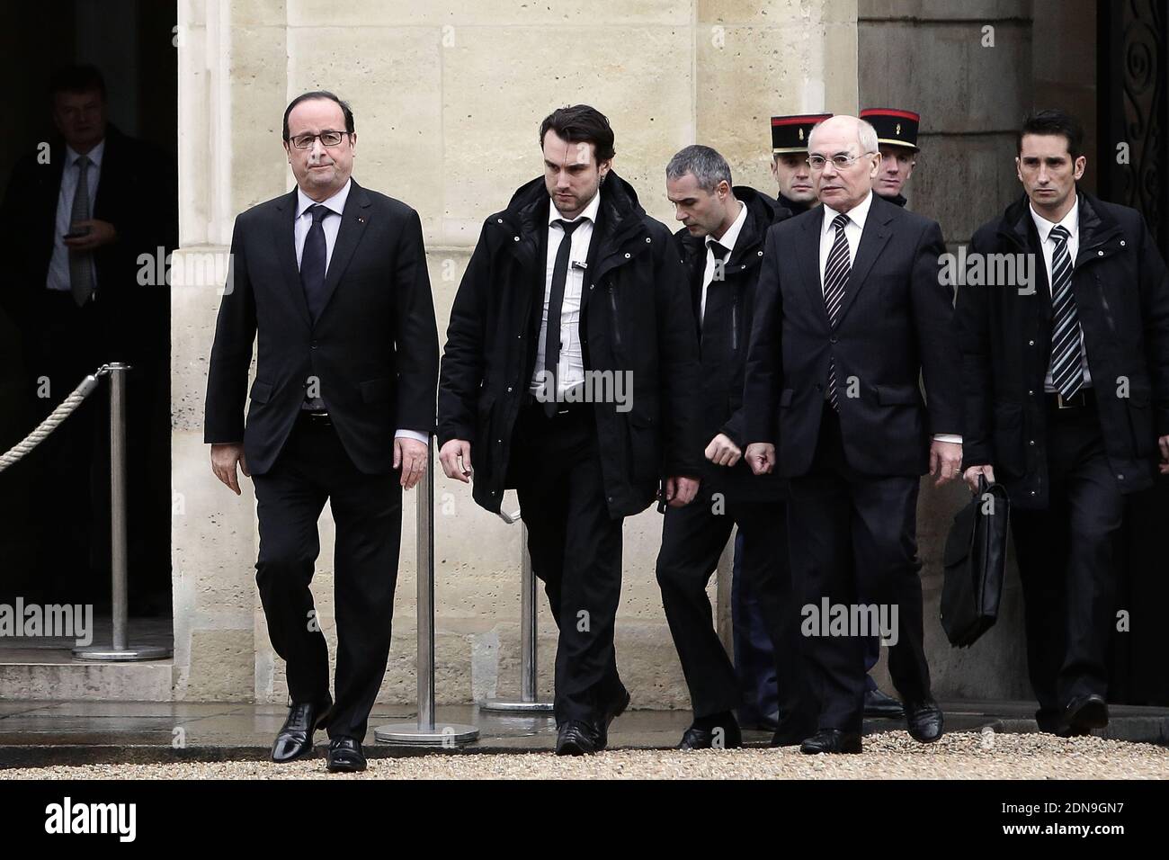 French President Francois Hollande flanked Thierry Lataste comes back to the presidential Elysee palace after a crisis meeting with French prefects at the Interior Ministry on January 9, 2015 in Paris, France. Two days after a deadly attack that occurred on January 7 by armed gunmen on the Paris offices of French satirical weekly newspaper Charlie Hebdo. France deployed elite forces in the hunt for two brothers accused of killing 12 people in the attack, as the pair spent a second night on the run despite a huge security operation. Photo by Stephane Lemouton/ABACAPRESS.COM Stock Photo