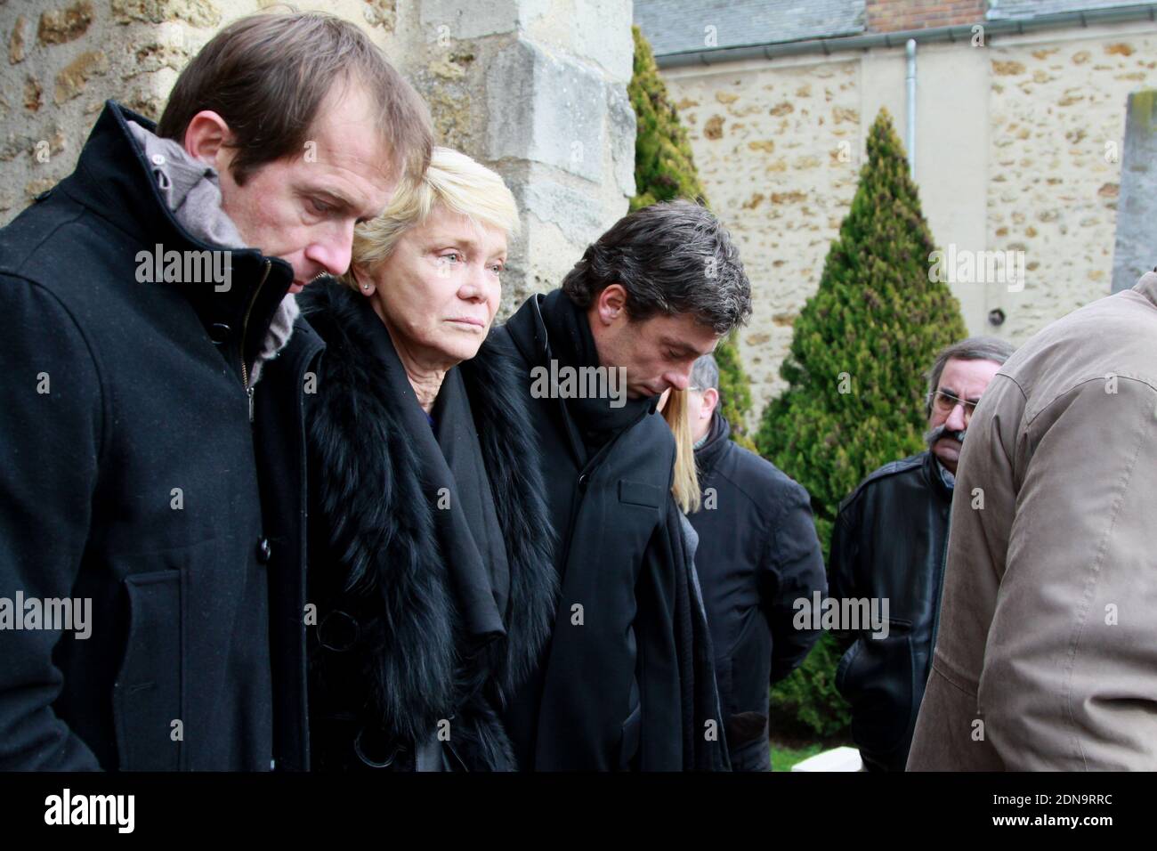 Jacqueline Beltoise with her sons Julien and Anthony attending the Jean-Pierre  Beltoise funeral ceremony in Saint-Vrain, France on January 12, 2015. Photo  by ABACAPRESS.COM Stock Photo - Alamy