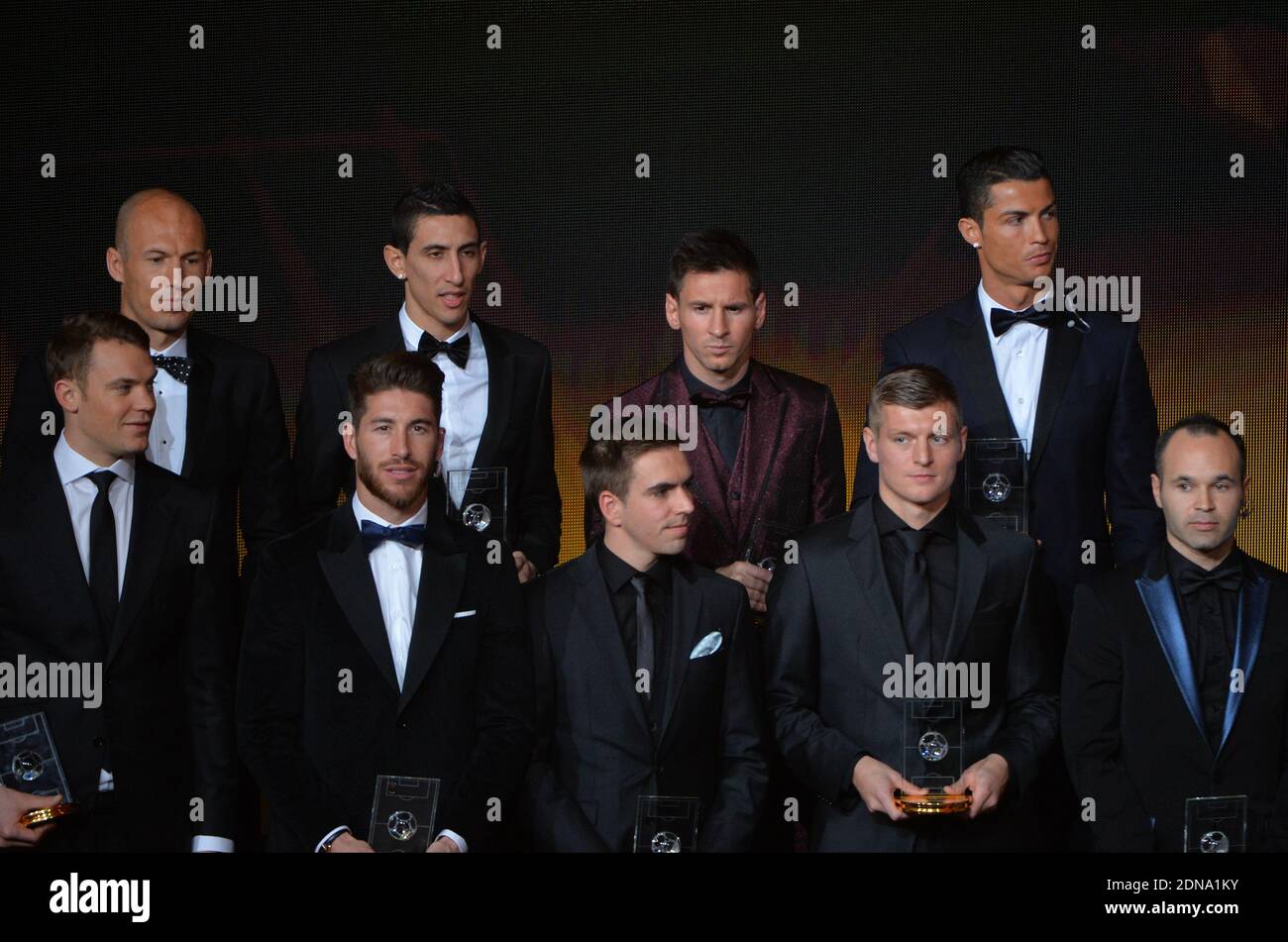 (Top - from L) Bayern Munich and Netherlands forward Arjen Robben, Manchester United and Argentina midfielder Angel Di Maria, Barcelona and Argentina forward Lionel Messi, Real Madrid and Portugal forward Cristiano Ronaldo (bottom - from L) Bayern Munich and Germany goalkeeper Manuel Neuer, Real Madrid and Spain defender Sergio Ramos, Bayern Munich and Germany defender Philipp Lahm, Real Madrid and Germany midfielder Toni Kroos, and Barcelona and Spain midfielder Andres Iniesta during the FIFA Ballon D’Or 2014 Award Gala at the Kongresshalle in Zurich, Switzerland on January 12, 2015. Photo by Stock Photo